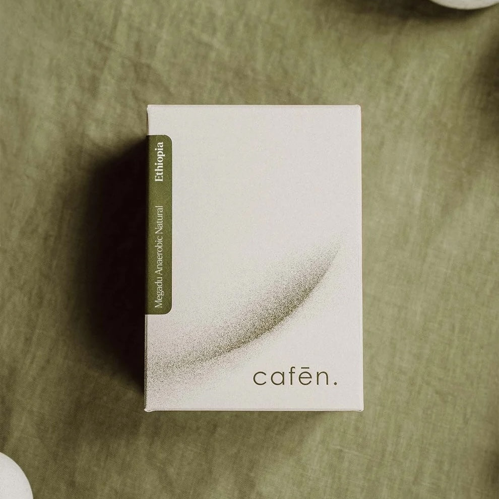 CAFĒN - Megadu